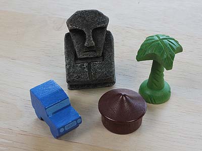 Tobago - Statuen, Palmen, Geländewagen und Hütten